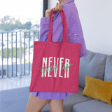 Never Give Up Tote Bag